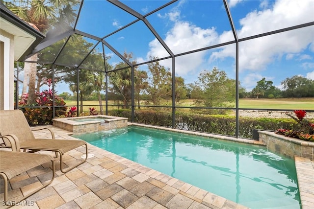 view of swimming pool with an in ground hot tub, a lanai, and a patio