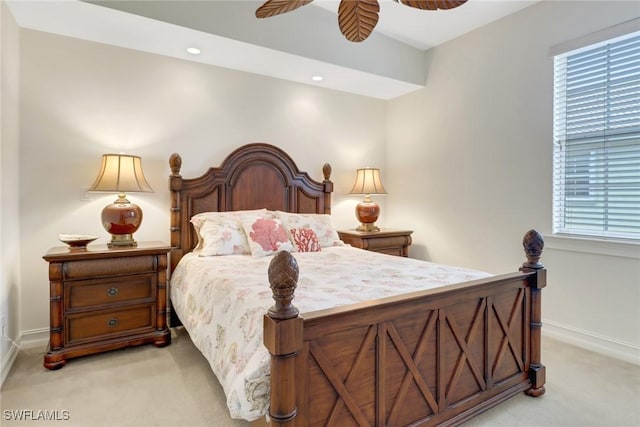 carpeted bedroom featuring ceiling fan