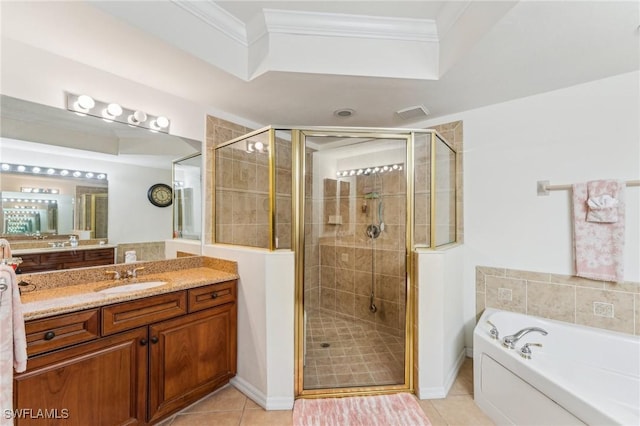 bathroom featuring independent shower and bath, ornamental molding, vanity, and tile patterned floors