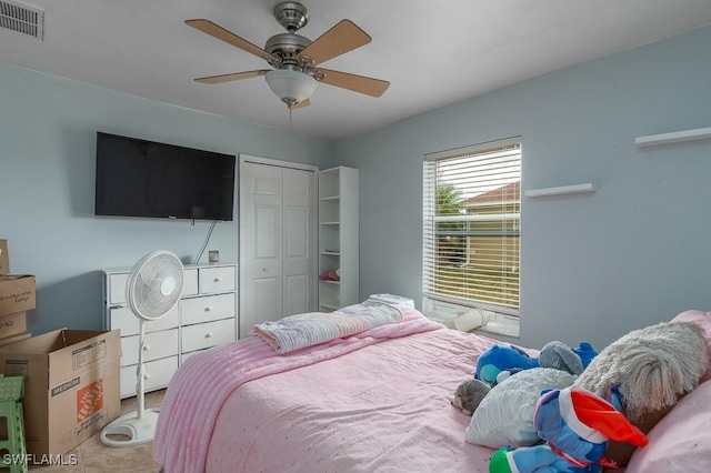 bedroom with a closet and ceiling fan