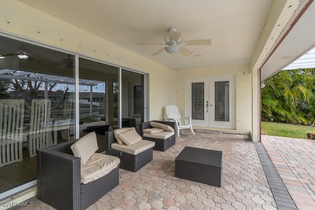 view of patio / terrace with ceiling fan, an outdoor hangout area, and french doors