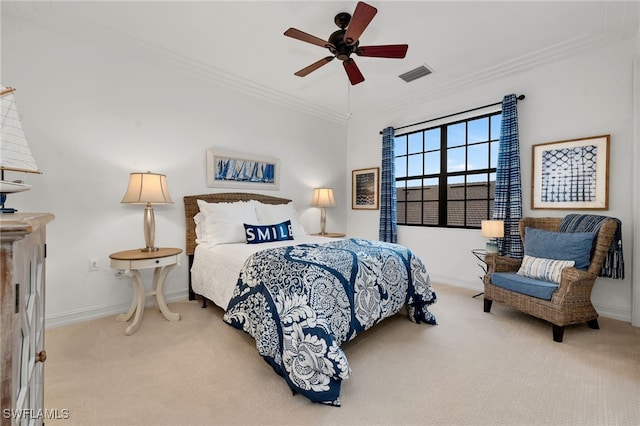 bedroom with ceiling fan, carpet, and ornamental molding