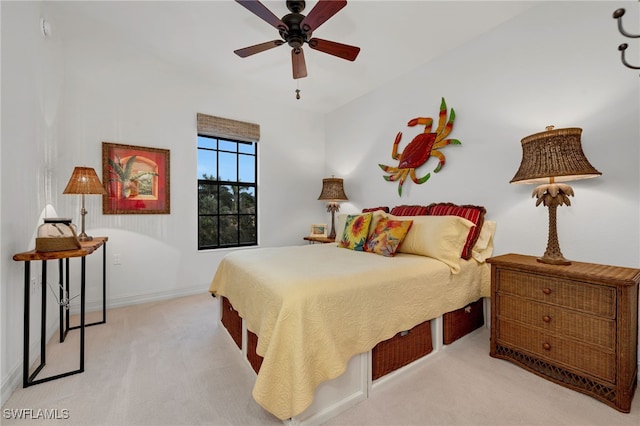 bedroom featuring ceiling fan and light colored carpet