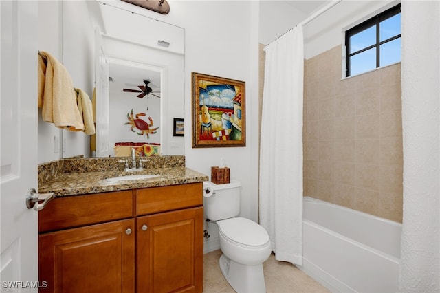 full bathroom with toilet, vanity, ceiling fan, tile patterned floors, and shower / bath combo