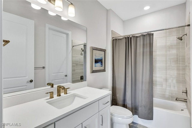 full bathroom with toilet, shower / bathtub combination with curtain, and vanity