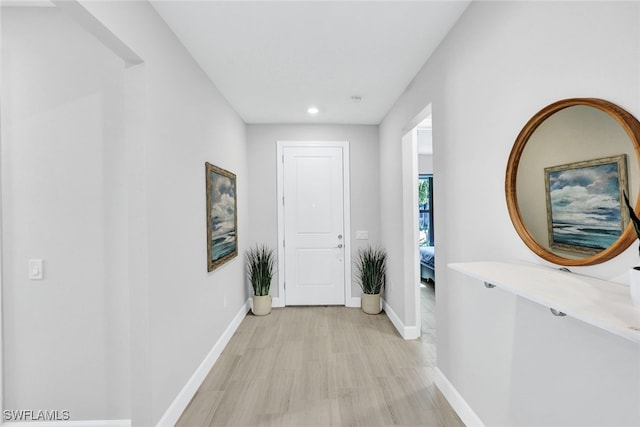 hallway featuring light hardwood / wood-style floors