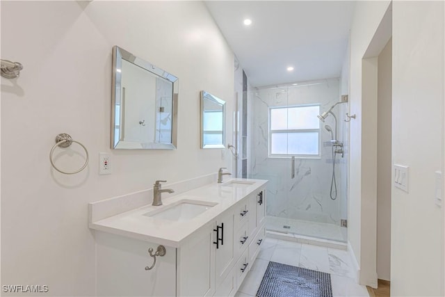 bathroom with vanity and an enclosed shower