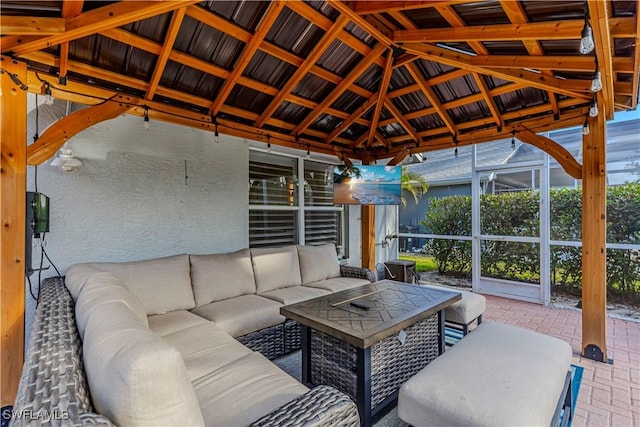 view of patio / terrace with outdoor lounge area and a gazebo