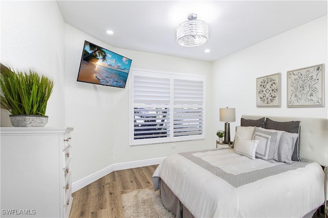 bedroom with light hardwood / wood-style flooring