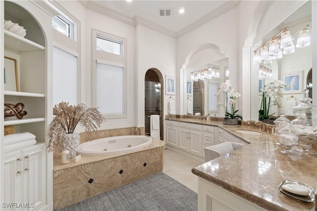 bathroom with vanity, tile patterned flooring, ornamental molding, and tiled bath