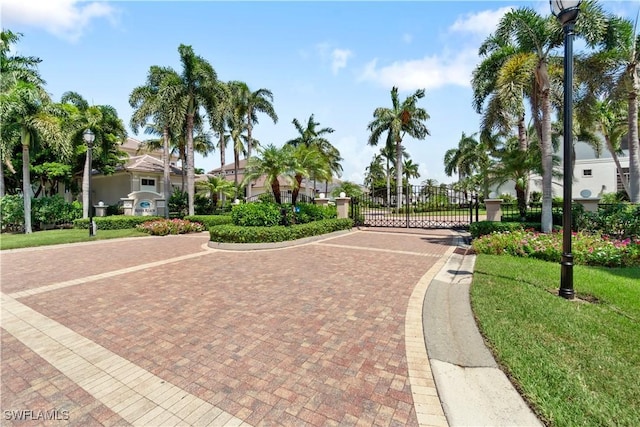 view of home's community featuring a yard