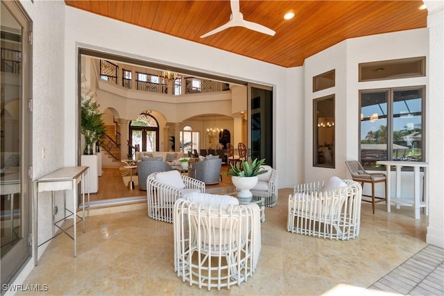 view of patio featuring ceiling fan