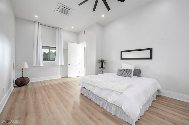 bedroom featuring light wood-type flooring and ceiling fan