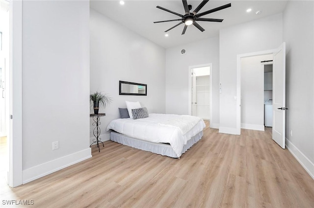 bedroom with ceiling fan and light hardwood / wood-style flooring