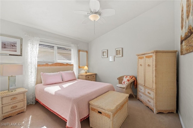 bedroom with ceiling fan, light colored carpet, and lofted ceiling