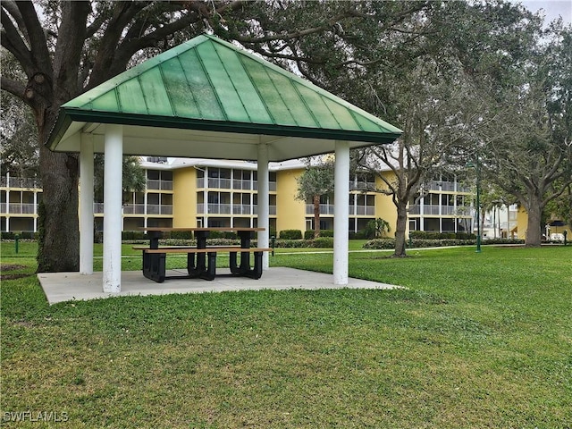 view of home's community featuring a gazebo and a yard