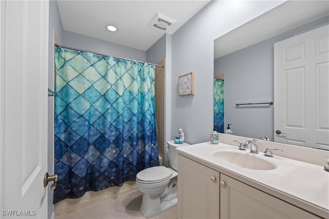 full bathroom with shower / bath combo with shower curtain, toilet, vanity, and tile patterned flooring