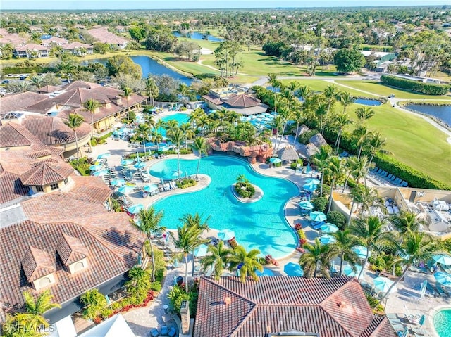 birds eye view of property featuring a water view