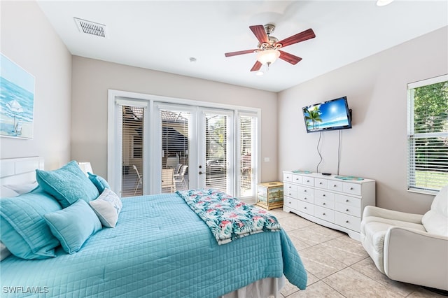 bedroom with ceiling fan, access to exterior, light tile patterned flooring, and french doors