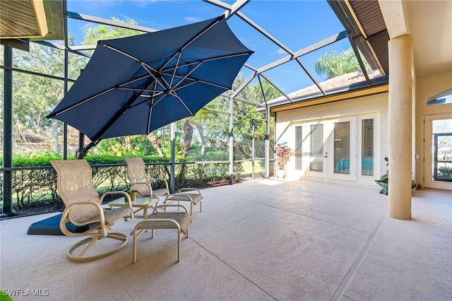 view of patio / terrace with glass enclosure and french doors