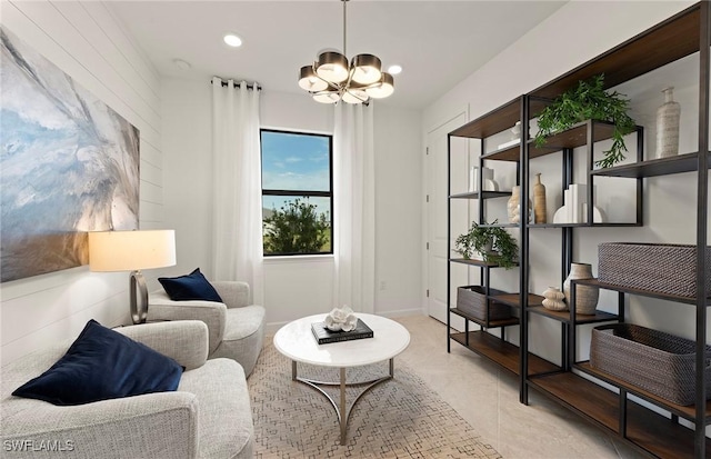 sitting room with an inviting chandelier