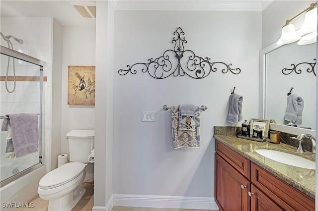 full bathroom with enclosed tub / shower combo, toilet, vanity, and crown molding