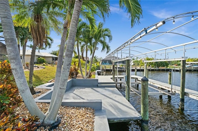 view of dock with a water view