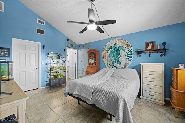 bedroom featuring a textured ceiling, ceiling fan, light tile patterned floors, and high vaulted ceiling