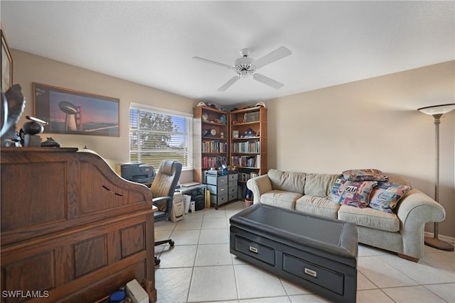 office space with light tile patterned flooring and ceiling fan