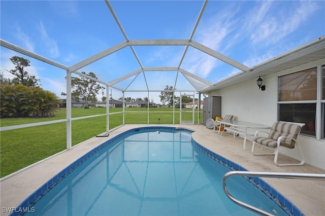 view of pool featuring a lanai, a yard, and a patio