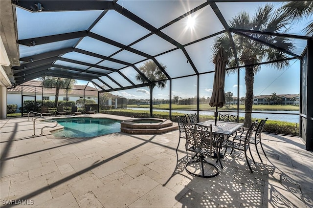 view of pool featuring a patio area, a lanai, an in ground hot tub, and a water view