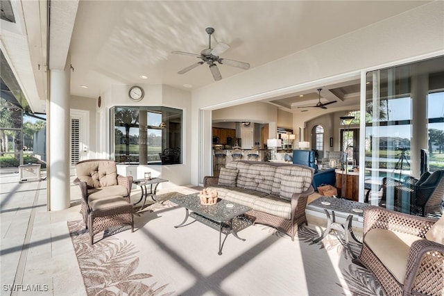 view of patio / terrace featuring ceiling fan and an outdoor hangout area