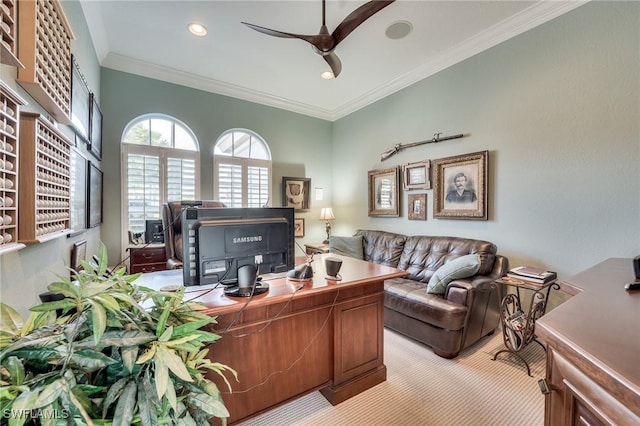 office with ceiling fan, crown molding, and light carpet