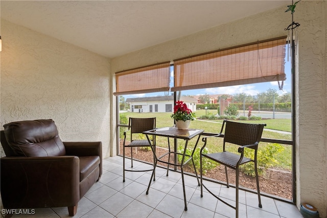 sunroom / solarium featuring a wealth of natural light