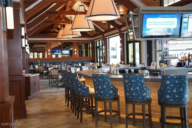 bar featuring vaulted ceiling with beams and wood ceiling