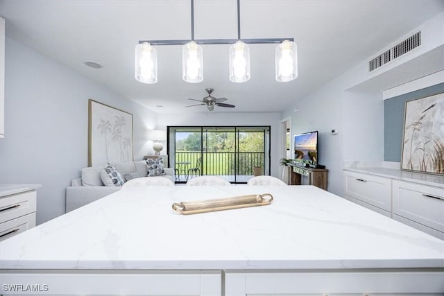 bedroom featuring ceiling fan and access to outside