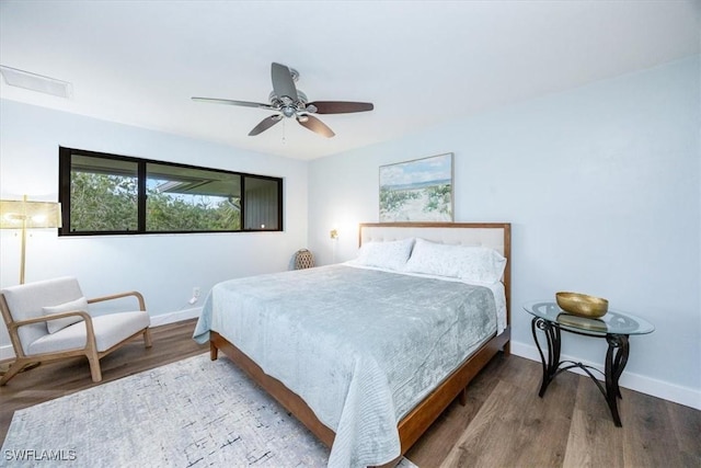 bedroom featuring ceiling fan and light wood-type flooring