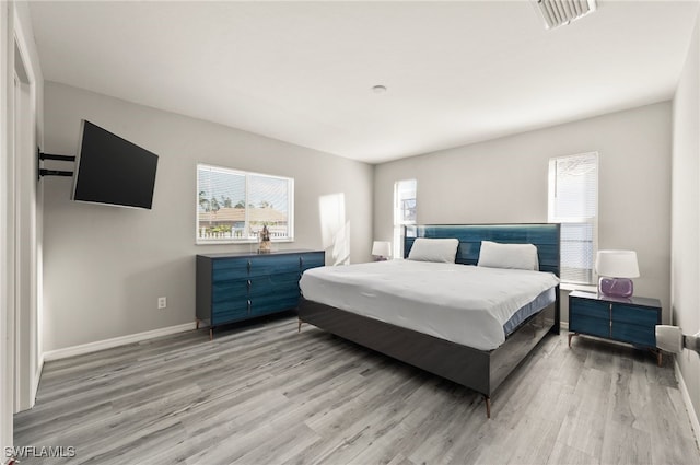 bedroom featuring light hardwood / wood-style flooring