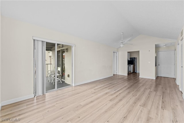 unfurnished living room with vaulted ceiling, ceiling fan, and light hardwood / wood-style floors