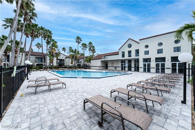 view of pool featuring a patio