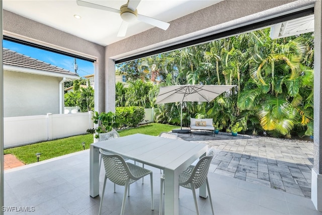 view of patio with ceiling fan