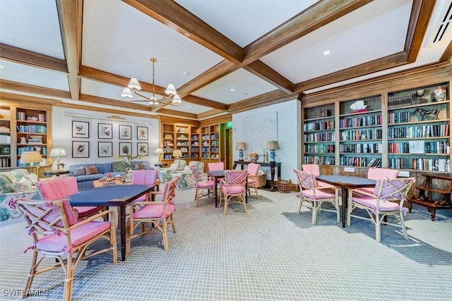 dining room with built in features, carpet floors, coffered ceiling, an inviting chandelier, and beamed ceiling