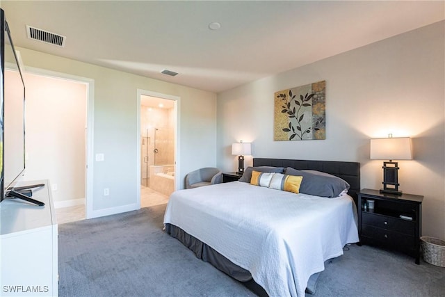 carpeted bedroom featuring connected bathroom