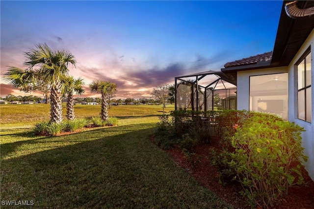 yard at dusk with a lanai