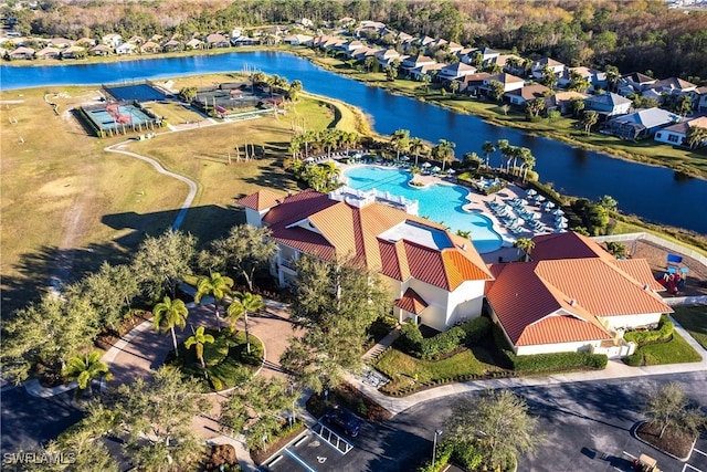 bird's eye view with a water view