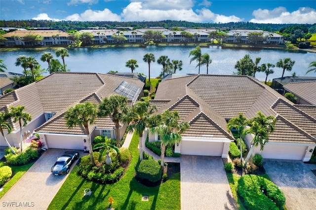 bird's eye view with a water view