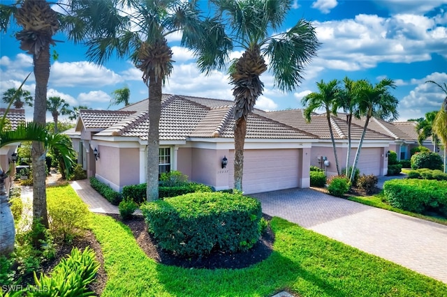 view of front of home with a garage