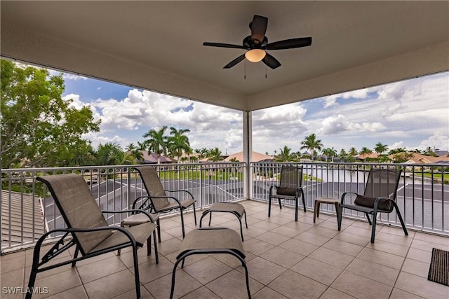 view of patio / terrace featuring ceiling fan and a balcony