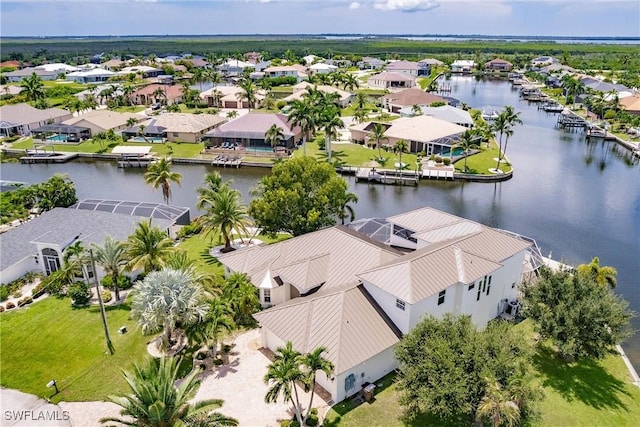 bird's eye view with a water view