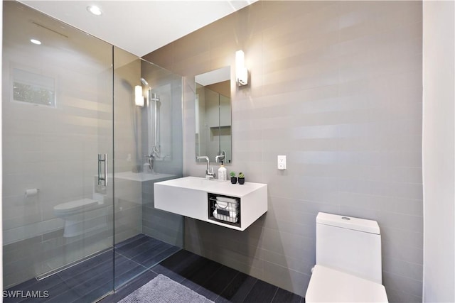 bathroom with walk in shower and toilet